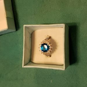 Lab created blue Topaz and white sapphires set in 925 sterling silver